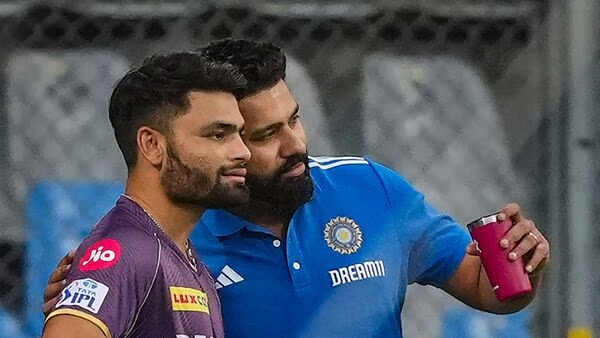 Mumbai: Mumbai Indians player Rohit Sharma with Kolkata Knight Riders player Rinku Singh during a practice session ahead of IPL match between Kolkata Knight Riders and Mumbai Indians at Wankhede Stadium in Mumbai, Thursday, May 2, 2024. (PTI Photo/Kunal Patil) (PTI05_02_2024_000231B) (PTI)